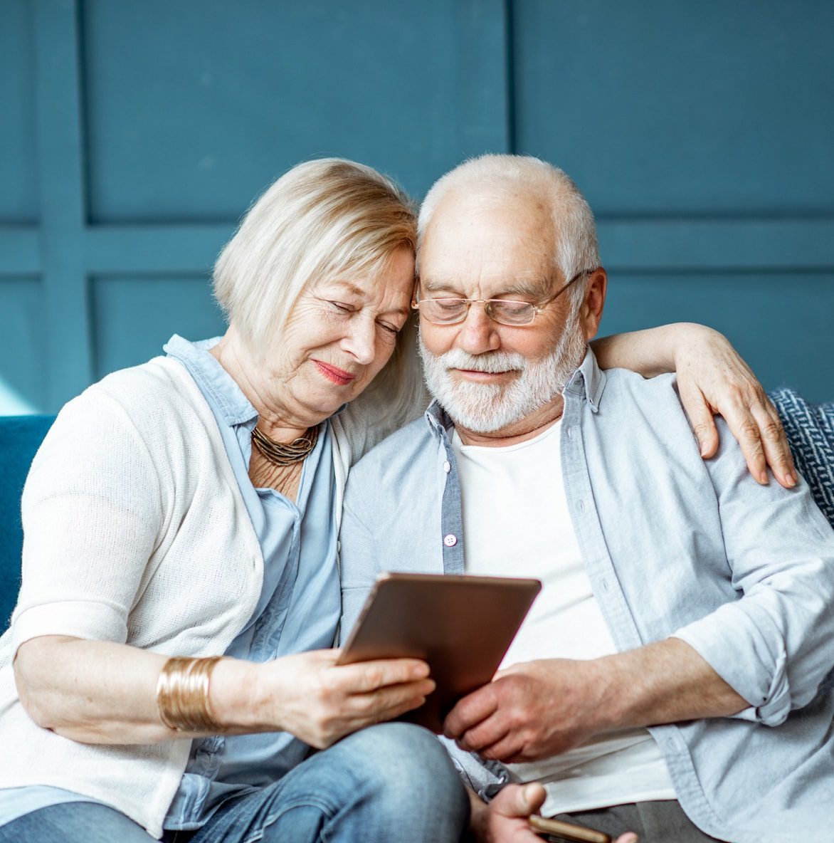 two people working together on a computer